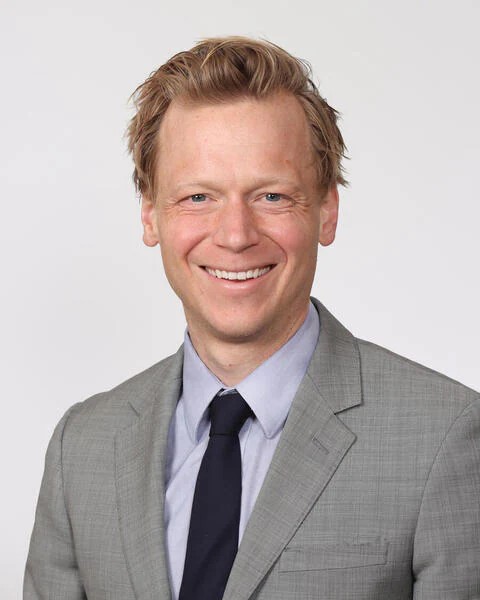 John C. Benson, MD